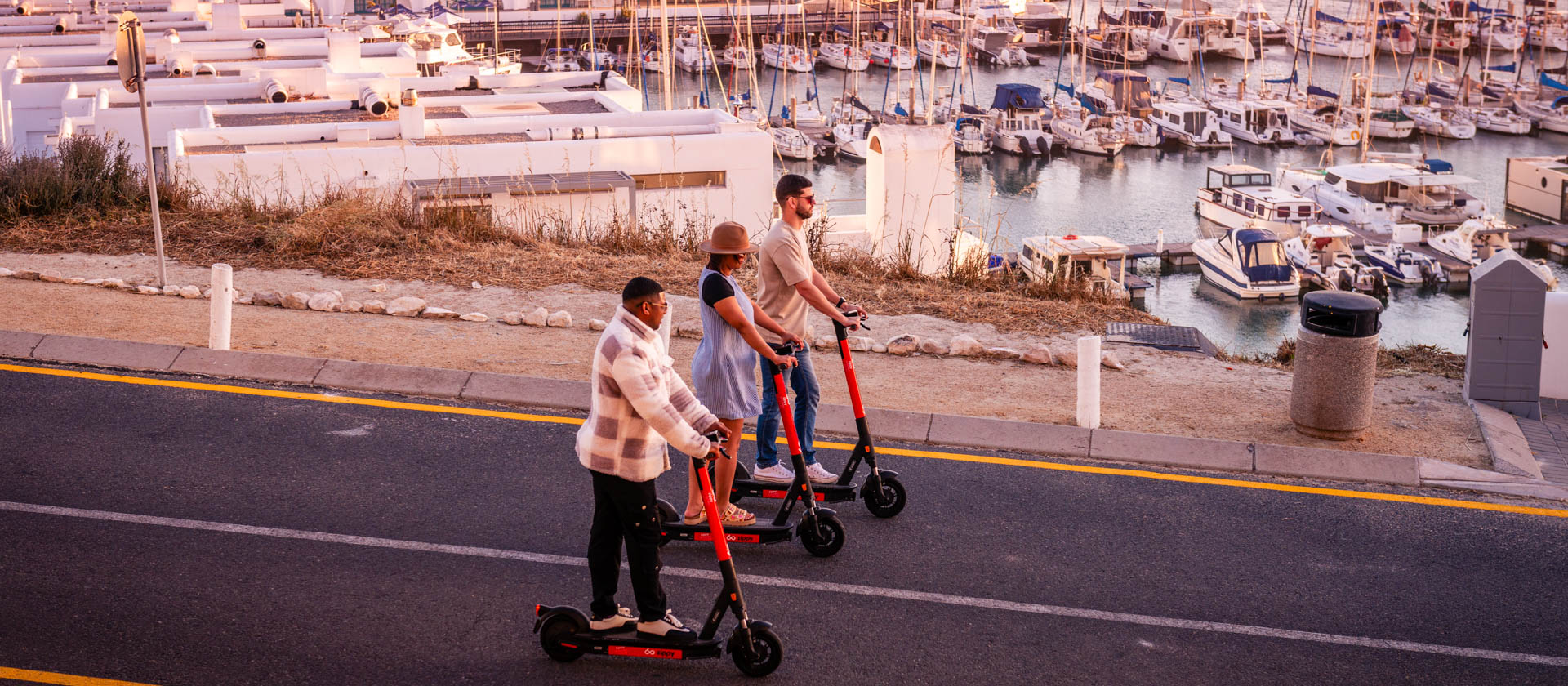 Man waving from Zippy scooter